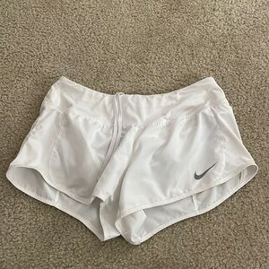White Nike shorts